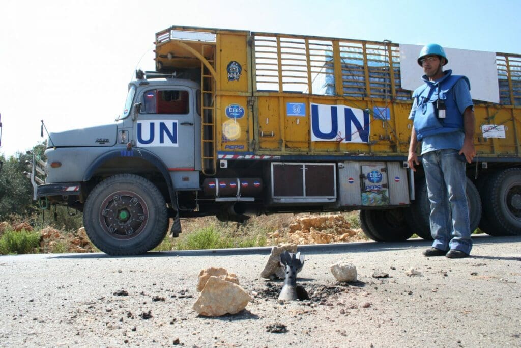 UN WFP Trucks transporting food encounter dangers