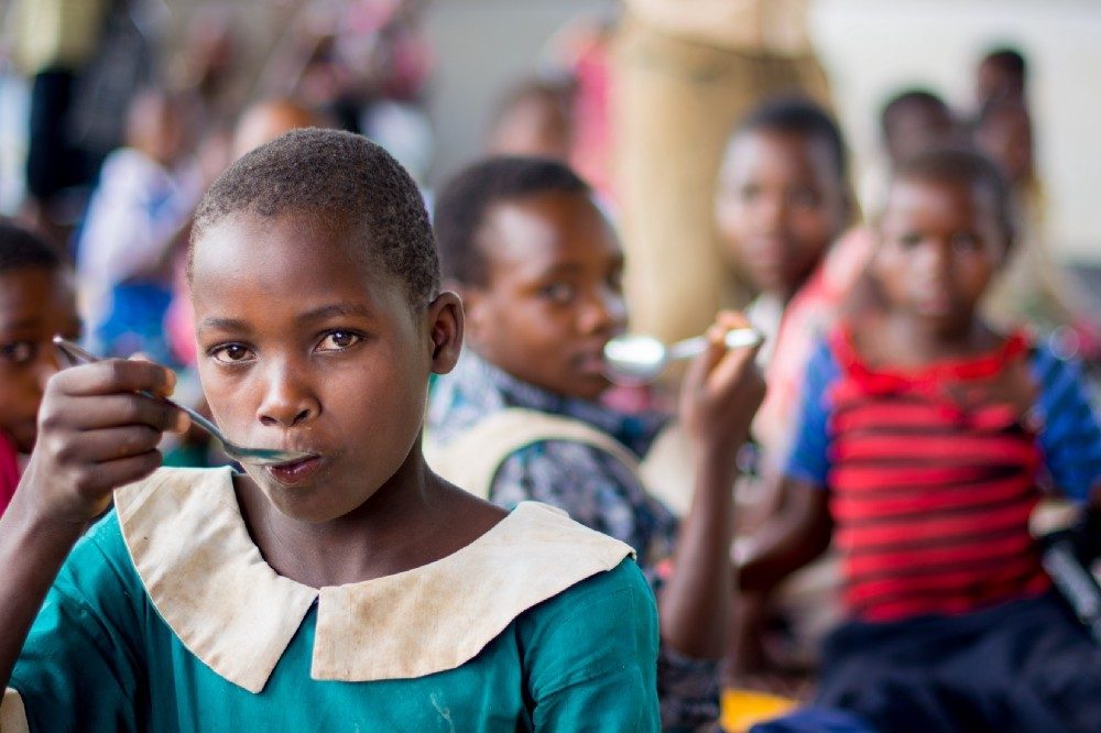 The Home-Grown School Feeding programme in Malawi supports local farmers, providing school meals using local produce to almost 1 million children.