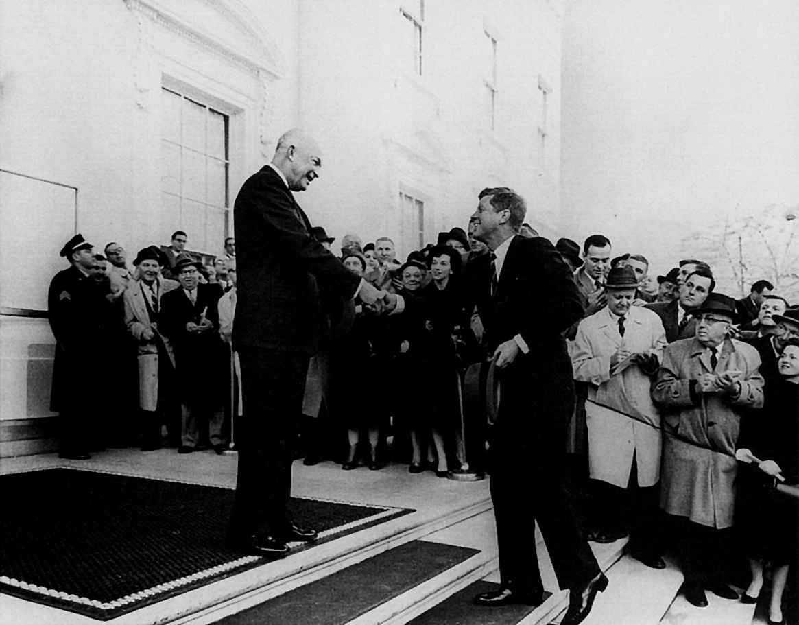 black and white photo of two men in suits