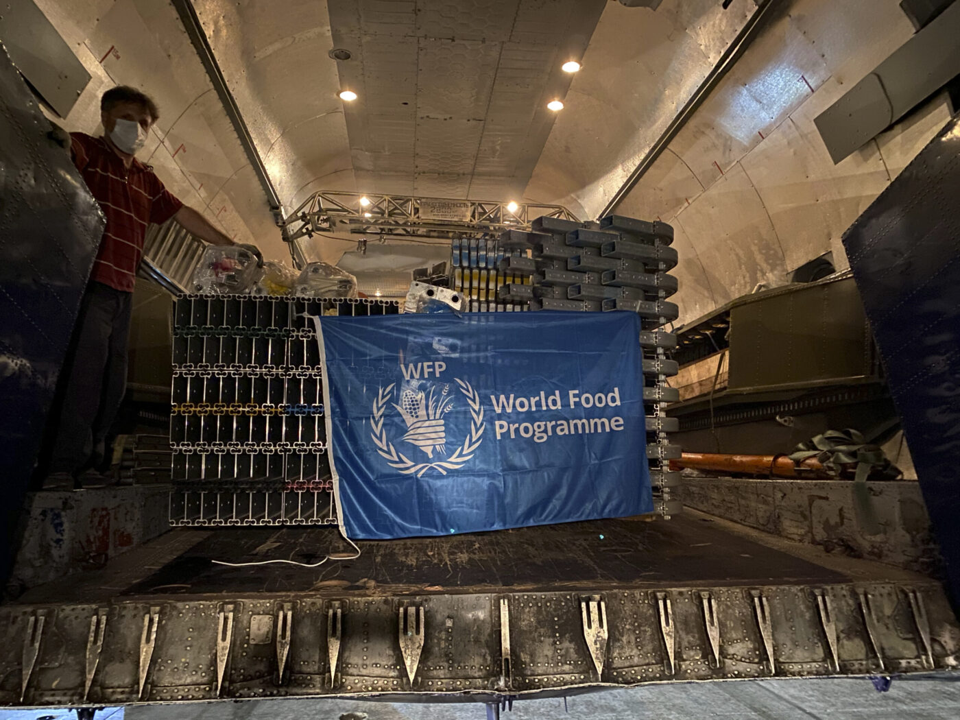 crates on aircraft with WFP flag