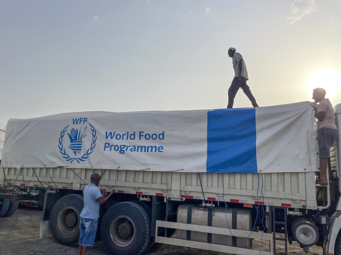 man standing on WFP truck