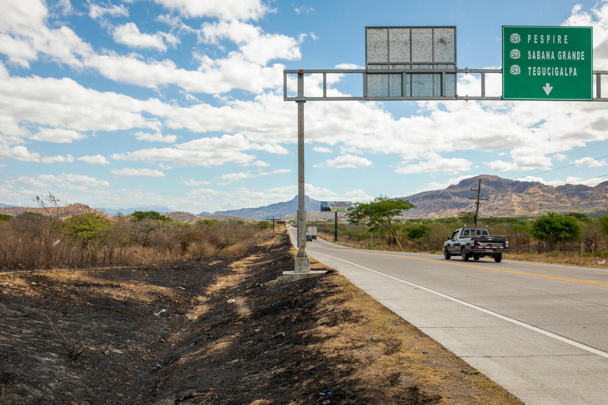 highway in Honduras with view of drought-stricken land