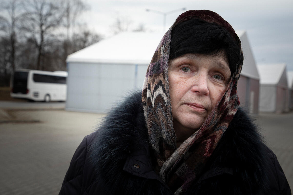 woman in fur coat and scarf