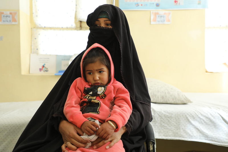 Malnourished children with mother in clinic in Kandahar a province located in southern part of Afghanistan.