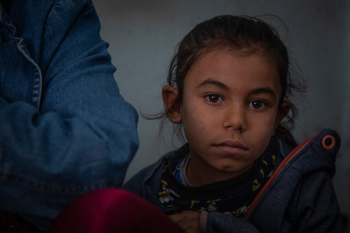 Syrian girl receives school voucher