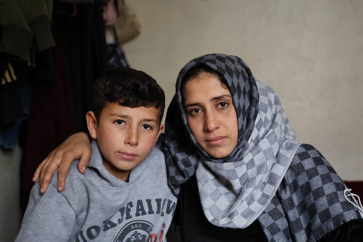 Issa with his mother in Syria