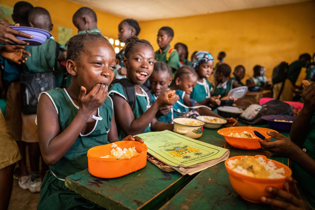 Children eating school meals in Sierra Leone