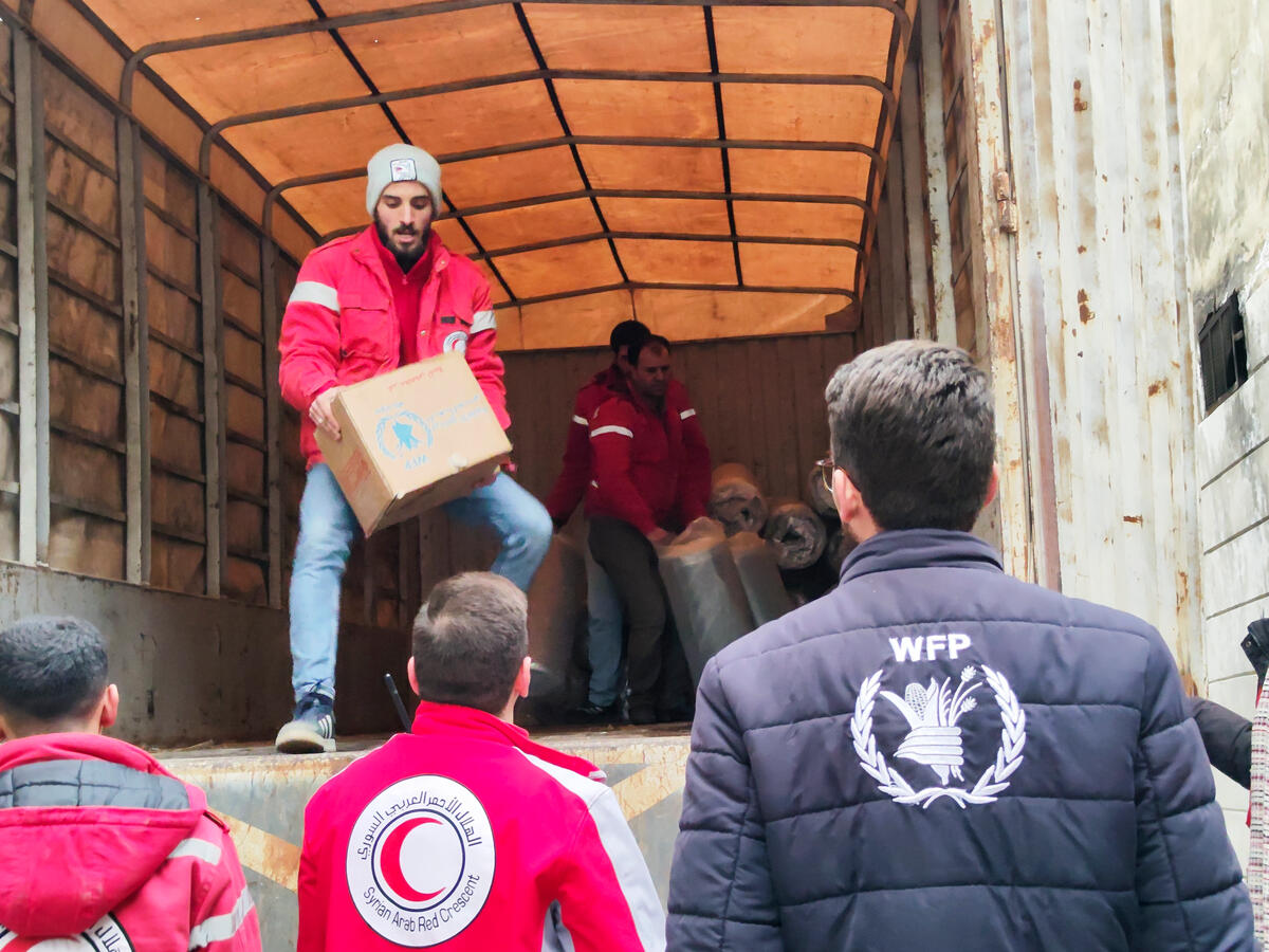 delivering WFP food rations to families displaced by earthquakes in Aleppo
