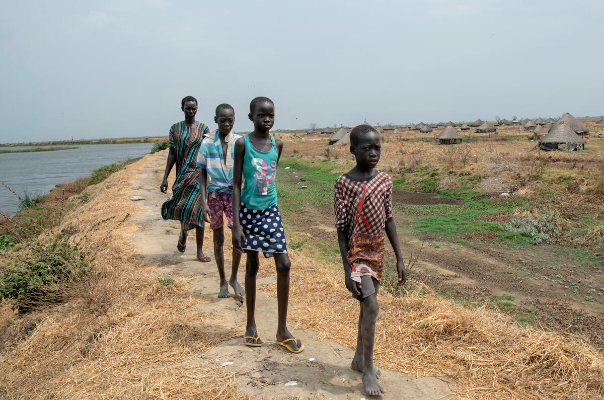Children walk along path in South Sudan
