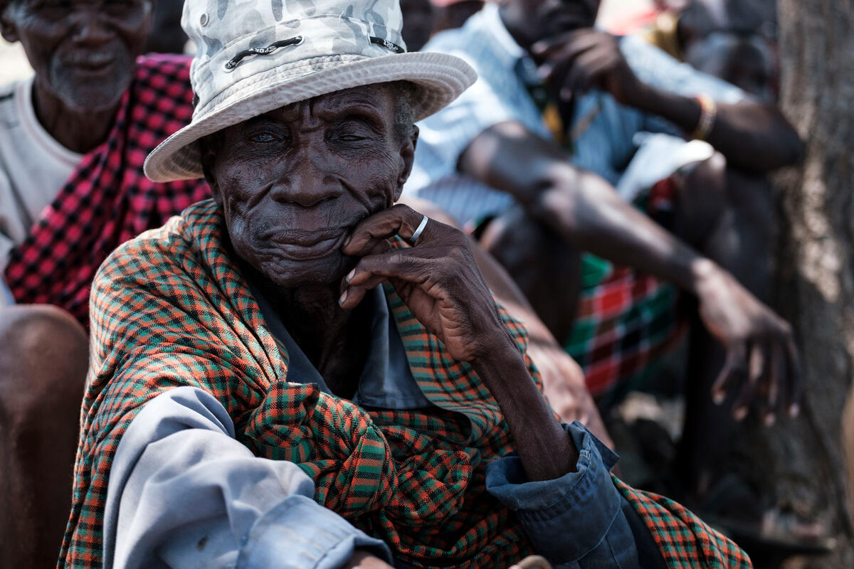 Man sits at WFP distribution site in Kenya