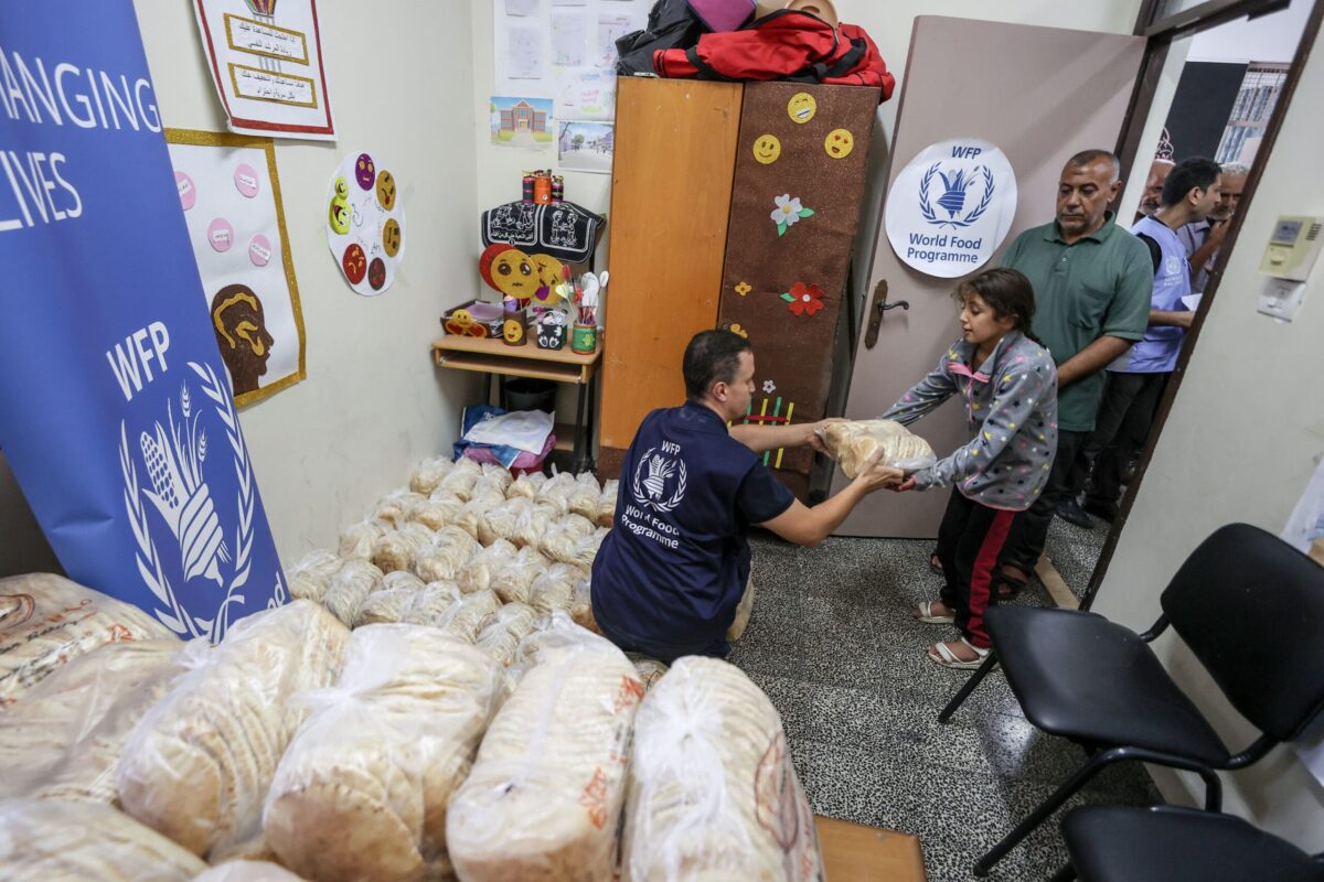 WFP staff distributing bread
