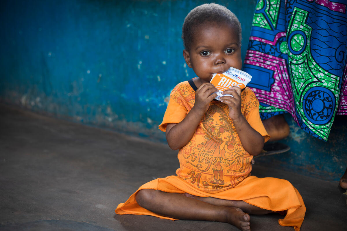 Mutshawudi eats fortified peanut soup in the DRC