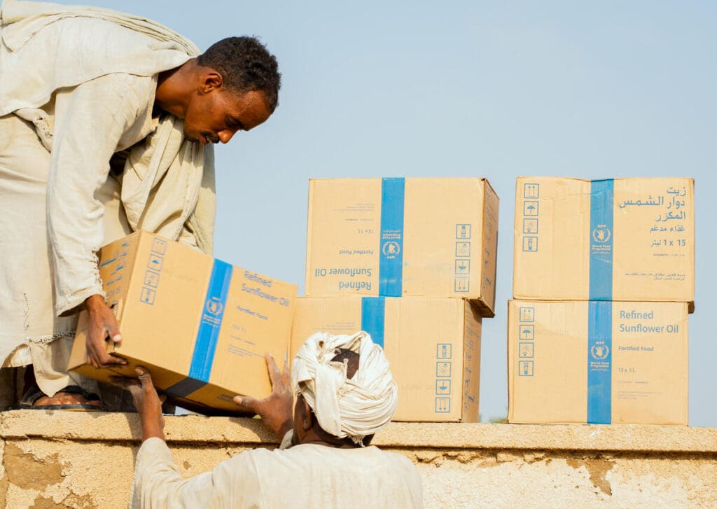 Offloading boxes of food in Sudan