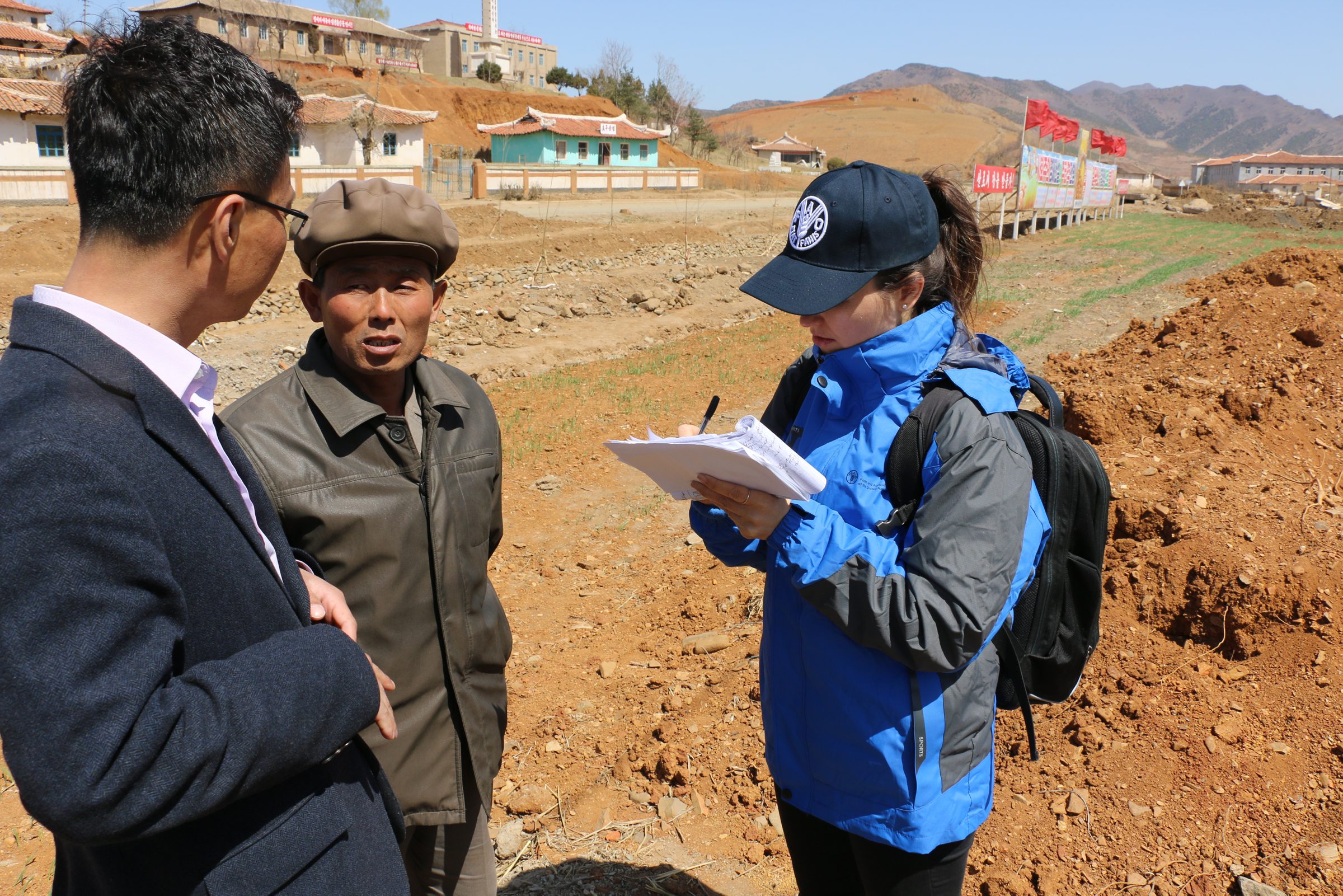 Democratic Peoples Republic of Korea (DPRK), Unpa County, North Hwanghae Province, 08 April 2019

A joint FAO-WFP rapid Food Security Assessment Mission (rFSAM) to the Democratic Peoples Republic of Korea (DPRK) took place in March-April 2019, visiting counties across the country. The assessment follows concerns raised about the harvests in 2018 reportedly affected by floods and drought, and a subsequent appeal for support by the government. 

Our field teams spoke to farmers, households, nurseries and local officials in counties across the country, and we have witnessed a very serious and concerning situation. What is clear is that a succession of climate shocks including drought, heatwaves and floods, in some areas affecting the same communities one after the other, has had a dramatic effect on crop production. That, combined with an agriculture constrained by lack of agricultural inputs, fuel and spare parts are pushing large numbers of people into a worrying food security situation. These communities need urgent humanitarian support to safeguard their food security and nutrition status, said Nicolas Bidault, co-lead of the assessment mission, and WFP Senior Regional VAM Adviser for Asia and the Pacific.  

During the mission, teams met with senior government officials in the capital Pyongyang, and visited rural areas of the country, where they met with farmers, rural and urban households, public distribution centre staff, nurseries, county officials and humanitarian partners. 

In 2019, WFP is working to assist 770,500 women and children in DPR Korea every month, providing nutritious, fortified cereals and biscuits that can address their nutritional needs. These foods are targeted through institutions that include nurseries, hospitals and child institutions. 

In the Photo: Assessment mission team visit a cooperative farm. Members, farmers and county officials discuss the barley winter crop growth and how it has been affected by the dry conditions ov
