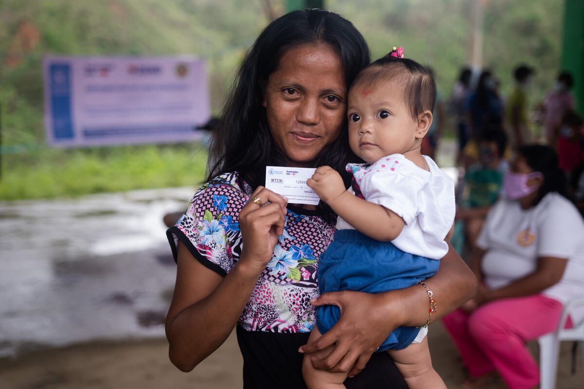 Antonette B. Torrente, who is 26 years old, registers and receives her MTCN in Pagsangahan, Catanduanes, on 17th December 2020. WFP is providing support to local communities in Catanduanes, Philippines, following the devastating effects of Typhoon Goni. Antonette, a mother of 3, struggles with the lack of food, money, and clothing due to the typhoon. Proper access to to to their village became severely limited when their newly built bridge was destroyed as well. As a result, she&#039;s also been scavenging for food to feed her children.

WFP is providing support to local communities in Catanduanes, Philippines, following the devastating effects of Typhoon Goni.