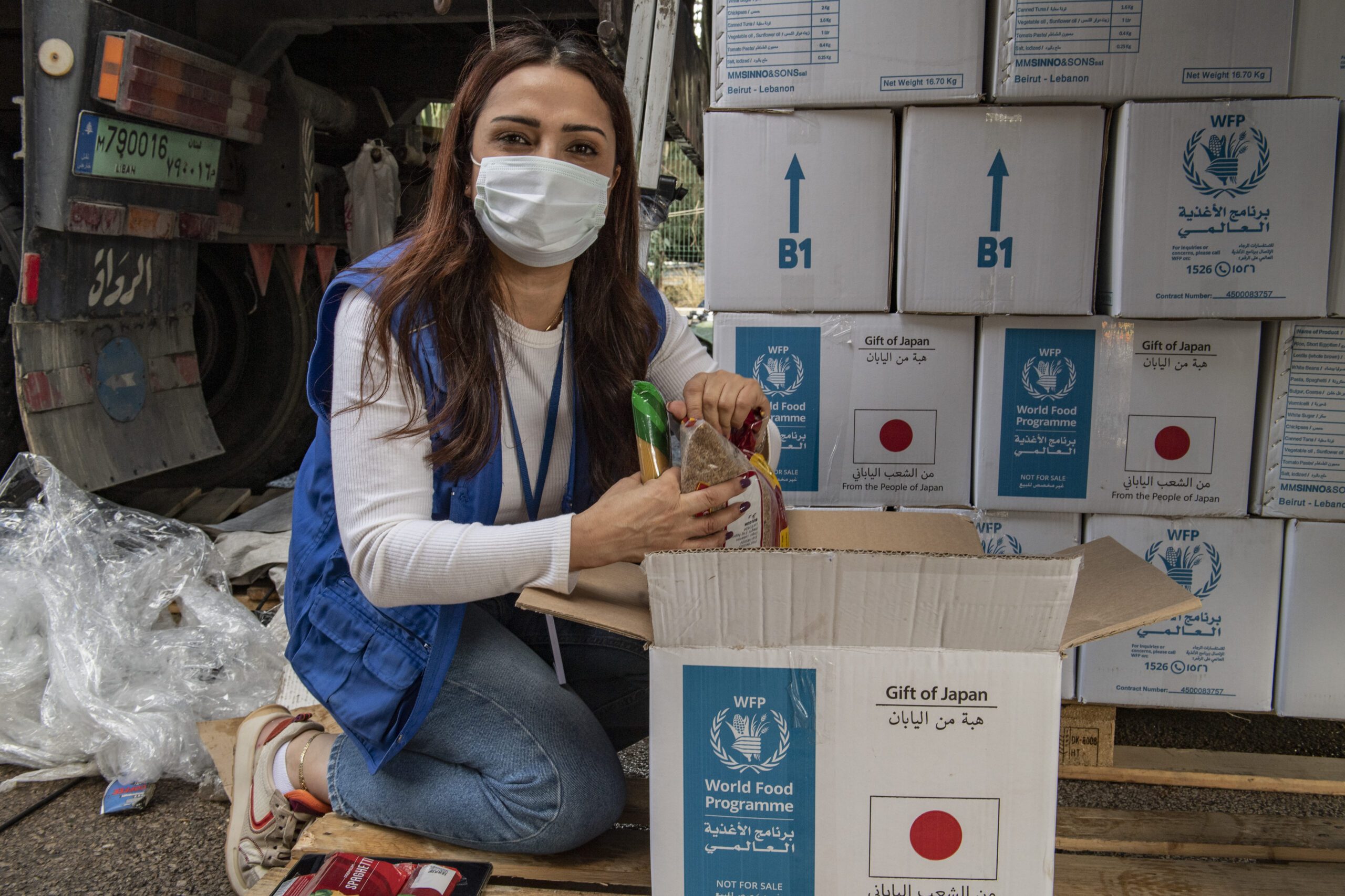 Lebanon, Beirut  25 November 2022
Ms. Massar Karaouni, Field Monitoring Assistant
WFP Monitors in-kind food distribution operations to make sure that the activity runs smoothly between the implementing partner and the people we help. If any issue gets raised, related to food parcels being delivered for example, WFP staff are on the available on the ground and can be approached directly with inquiries.
“I joined WFP two years ago as a field monitoring assistant, over the last three months I have been acting as the focal point for in-Kind distribution. I consider this as a growth opportunity in my career but what really brings happiness to my heart is to be able to help and to see the people’s gratitude and relief when they receive their food parcels, or whenever someone has a complaint or issue I am able to be in contact with him or her and do my best to solve the problem, after all this is what we all aim for, to help humanity somehow, so playing a role in making someone happy or relieved from hunger fuels my motivation to come to work every day and do my best in my job to fulfill that goal. ”
At the height of the COVID-19 pandemic, in-kind food was chosen as WFP’s initial crisis response to mitigate the risk that people would not be able to go to shops or ATMs because of lockdown measures. Now, WFP provides in-kind food assistance to mitigate the risks of market volatility and threats to food availability and access.
The provision of food parcels helps counter the impact of inflation and decreased purchasing power for families, freeing up resources to cover their other basic needs.
Assistance is delivered as a monthly family food ration designed to provide 95 percent of the total individual energy requirement. The baskets are being procured both locally and internationally, and include rice, pasta, bulgur, lentils, beans, chickpeas, canned tuna, vegetable oil, salt, vermicelli, tomato paste, and sugar allowing WFP to provide nutritionally balanced food